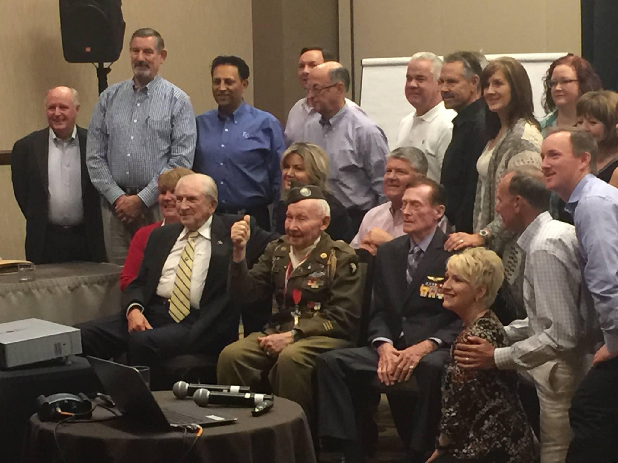 Group of veterans posing for picture