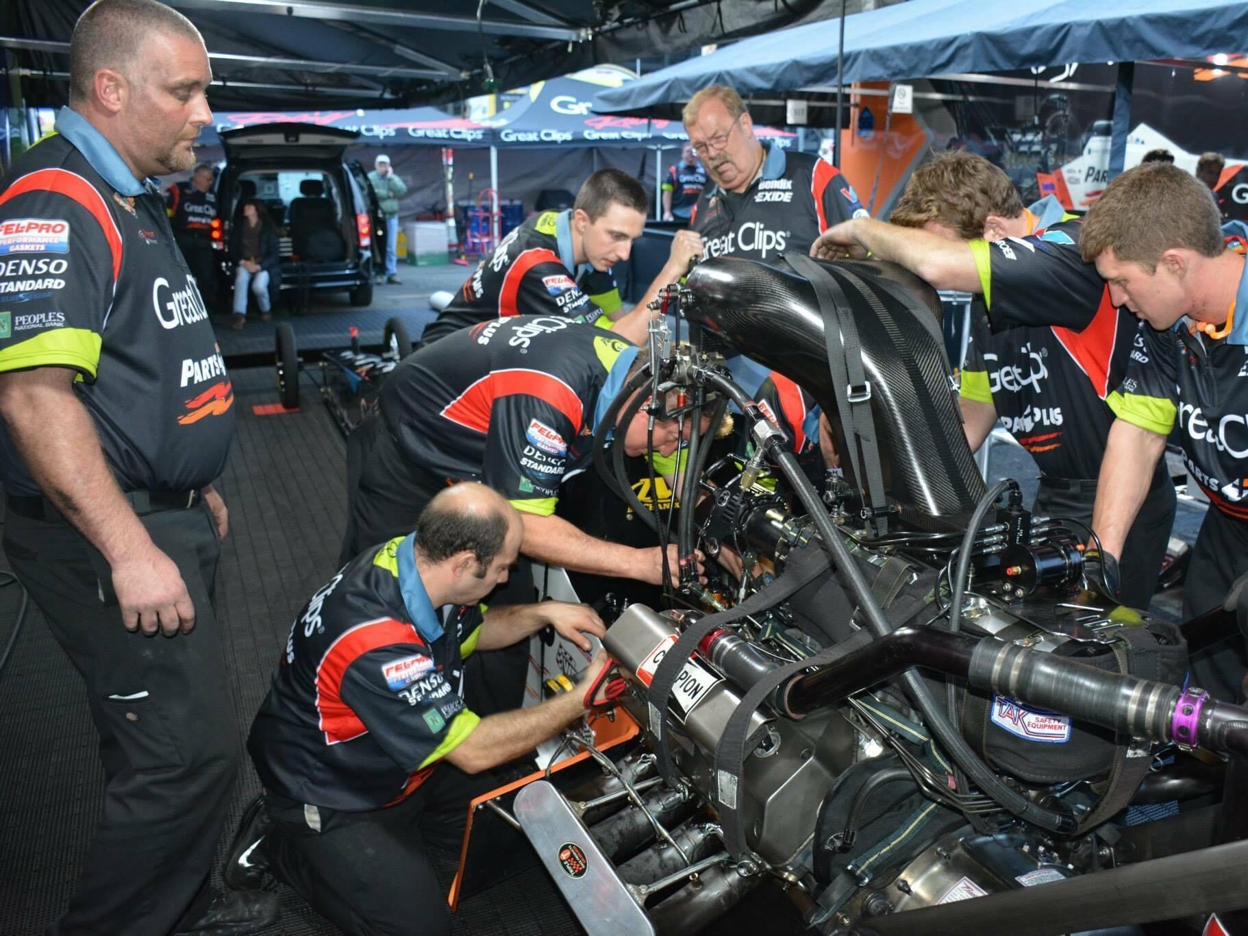 Trackside Veterans guests experiencing the pit area at a race