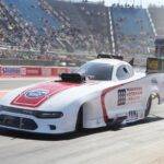 Image of the Trackside Veteran Salute Drag Car launching on drag strip