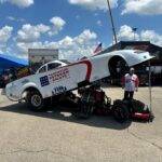 Trackside Veteran Salute Foundation Drag Car Body lifted revealing the engine