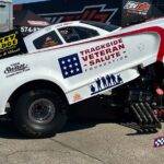 Trackside Veteran Salute Foundation Drag Car Body lifted revealing the engine